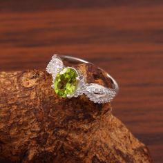 Peridot Ring, Natural Peridot Ring, Wedding Ring, Green Stone, Oval Cut Stone Ring, August Birthstone, Brides Ring, Engagement Ring Gift Her Stone Name: Natural Peridot Shape : Oval Stone Size : 6x8 MM Metal : 925 sterling silver finished with Rhodium nickel free Beautifully handcrafted as u can see in pics100% handmade more quantity available on demand We accept Custom Order If you have any questions about this piece or if we can help you with any of our other products please feel free to conta Anniversary Peridot Diamond Ring, White Gold Peridot Rings For Wedding, Green Oval Topaz Ring For Wedding, Peridot Diamond Wedding Ring, Fine Jewelry Peridot Wedding Ring, Fine Jewelry Peridot Ring For Wedding, Oval Topaz Ring For Wedding, May Birthstone, Wedding Peridot Diamond Ring, Peridot Birthstone Ring With Center Stone For Wedding