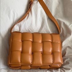 Authentic Bottega Veneta Padded Cassette Crossbody Bag Color - Clay - Crossbody Bag - Adjustable Strap - Brand New - With Tags / Plastic Stickers Still On Button Comes With Dust Bag - Minor Scuff On The Inside Of The Bag (Last Pic) Was Sent To Me Like This, Never Worn Out - No Trades - Poshmark Will Authenticate Rectangular Intrecciato Shoulder Bag For Shopping, Rectangular Intrecciato Weave Shoulder Bag For Shopping, Square Shoulder Bag With Intrecciato Weave, Botegga Veneta, Padded Cassette Bag, Bottega Bag, Nike Tights, Bottega Veneta Handbag, Bottega Veneta Bag