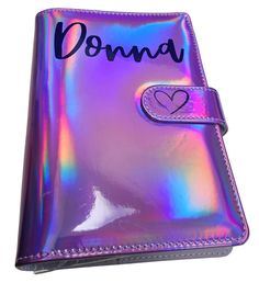 a purple and blue wallet with the word donna written in black ink on it's side