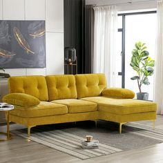 a yellow sectional sofa in a living room