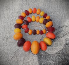 a bunch of different types of fruit arranged in a circle on top of a table