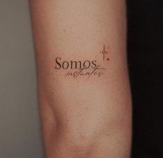 someone has a tattoo on their arm that says, somos membres in cursive writing