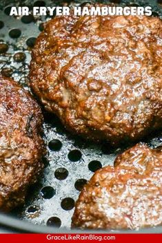 hamburgers cooking in a frying pan with the words air fryer hamburgers