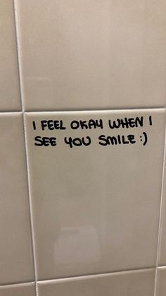 i feel okay when i see you smile sticker on the wall in a bathroom