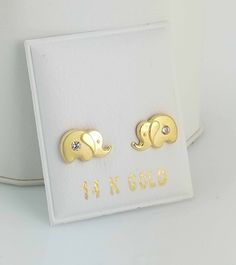 This Cute and Precious dainty Elephant Stud Post Earrings are made from high quality Solid 14k Gold They are a perfect gift for anyone of any age and excellent for everyday wear. Item Specifications: Model # BE-B413S01 Metal Type: Solid 14K Gold Metal Stamp: 14K Shape: Elephant Fastening: Screw Back Style: Stud Post Size: Medium Size: 6x 10mm ( 2/8 x 3/8 inch) Stone: Cubic Zircon Earrings Puff Pad size: 1 3/8 inches x 1 1/8inch (35mm x 28mm) The screw backs are really good for kids and adults be Gold 14k Diamond Earrings Gift, Hypoallergenic Yellow Gold Diamond Earrings As Gift, Hypoallergenic 14k Gold Diamond Earrings Gift, 14k Yellow Gold Earrings For Birthday, Fine Jewelry Yellow Gold Earrings For Mother's Day, Mother's Day Fine Jewelry Yellow Gold Earrings, Mother's Day Yellow Gold Fine Jewelry Earrings, Hypoallergenic Yellow Gold Earrings For Mother's Day, 14k Gold Stamped Earrings For Gifts