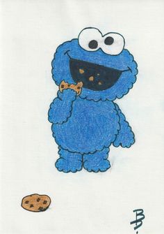 the cookie monster is standing next to a cookie