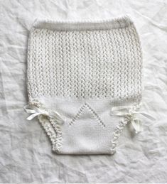 "FRENCH vintage 70's, beautiful little knitted briefs, white pure cotton knit, satin ribbons to knot. Estimated size 3 years Length 10,2\" - Waist ( taken flat without stretching the elastic ) 7,4\" Vintage condition level 5, new old stock ( washed once ). We assess the condition of our vintage items on a scale from 0 to 5. Level 5 corresponds to an almost new vintage condition. Any defects are systematically reported. Even though in very good condition, vintage items may present imperfections d Fitted White Cotton Diaper Cover, Cotton Tunic Tops, Satin Ribbons, Level 5, Vintage Clothes, Knit Outfit, Cotton Knit, Vintage Linens, New Vintage