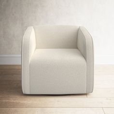 a white chair sitting on top of a hard wood floor