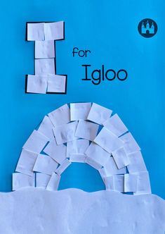 a blue book with white pieces of paper on it and the title i for igloo