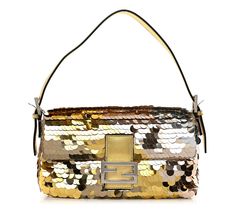 Your purchase of a Pre-Owned Designer Handbag will include an attached authentication tag, ensuring it has met the highest of standards and verifying its authenticity. All returns must include this authentication tag still attached to the item.\n\nThe Pre-Owned Fendi Sequin Vitello Paillettes Laminato Baguette is an eye-catching shoulder bag that's adorned with gold and silver sequins and features a gold leather strap with a silver Fendi FF logo bar on the crossover flap. From Fendi. Ff Logo, Gold Satin, Gold Fabric, Silver Sequin, Hobo Handbags, Gold Leather, Fendi Bags, Fabric Covered, Gold And Silver