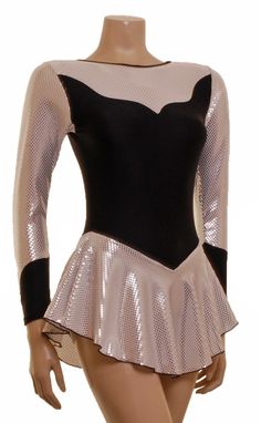 Long sleeve skirted skating dress with a stunning silver skirt foil and a body in black lycra. The neck and sleeves are edged in an black highlight.The dress has built-in nix for modesty. Figure Skating Dress, Silver Skirt, Skating Dress, Dress Silver, Womens Sports, Figure Skating Dresses, Skating Dresses, Silver Dress, Crushed Velvet