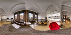 a fish - eye view of a living room and dining area in an apartment building