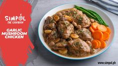 a white plate topped with meat and veggies next to a red background that says simply the cookbook garlic mushroom chicken