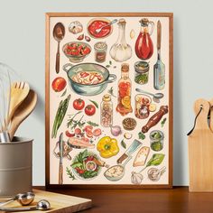 a kitchen scene with various cooking utensils on the table and an art print