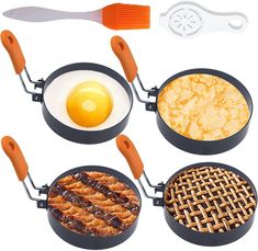 four pans with different types of food in them and an egg on the top