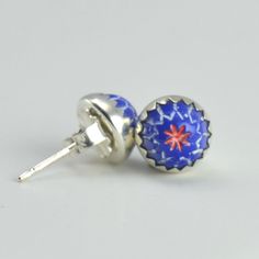 "This pair of all sterling silver stud earrings features 7mm vintage blue glass cabochons. These earrings are backed with sterling silver heavy-weight ear nuts. The earring posts are 3/8\" in length. Your earrings will be made to order, and you have a choice of finishes (see last picture for samples): bright shiny silver (polished) satin silver (a satin/semi-matte finish) oxidized and sanded (blackened then sanded lightly to remove some oxidation, leaving a slightly textured finish) oxidized and Traditional Sterling Silver Cabochon Earrings, Vintage Cabochon Metal Earrings, Blue Cabochon Sterling Silver Earrings, Silver Vintage Cabochon Cuff Bracelet, Elegant Blue Cabochon Clip-on Earrings, Multiple Earrings, Blue Chalcedony, Shiny Silver, Sterling Silver Studs