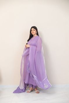 This beautiful three piece is designed on pure lilac organza heavily embellished with pretty floral threadwork, styled with a matching organza dupatta featuring gotah accents and straight trousers with motifs. The length of the long kameez is 47 inches. Shade number 4144 Order Duration: 4 to 6 weeks Salwar Ideas, Long Kameez, Organza Suit, Agha Noor, Organza Suits, Kurta Style, Beautiful Red Roses, Desi Clothes, Pink Suit