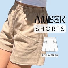 an image of shorts with the words amber shorts written in black and white on it