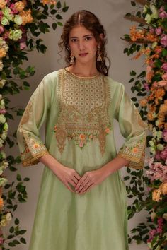 Pista green a-line kurta featuring dhoti and resham embroidery in floral pattern. Paired with a pant and scallop hem sheer dupatta. - Aza Fashions Pista Green Chanderi Kurta With Resham Embroidery, Green Dabka Kurta For Eid, Green Dabka Sets For Eid, Green Chanderi Kurta With Zari Work, Pista Green Chanderi Kurta With Dabka Work, Green Dabka Work Kurta For Eid, Festive Designer Lawn Suit In Pista Green, Festive Designer Wear Pista Green Lawn Suit, Anarkali Sets In Pista Green For Spring