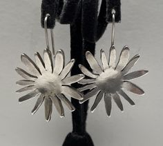 Beautiful Art Deco Vintage Signed Metal Pointus Paris Flower Dangle Earrings Silver Finish Good Pre/owned Condition measures 1.5" x 1" width. Flower Earrings Silver, Dangle Earrings Silver, Flower Dangle Earrings, Silver Flower Earrings, Deco Vintage, Vintage Metal Signs, Silver Earrings Dangle, Earrings Silver, Flower Earrings