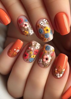 Go for glam! ✨ Elevate your orange tiny flowers and vines nail art with a touch of metallic gold or silver accents for a touch of sophistication. (Floral Nail Art Ideas) Cherry Blossom Nails Design, Pastel Nail Art, Pink Nail Art Designs, Cherry Blossom Nails, Simple Spring Nails, Yellow Nails Design, Thanksgiving Nail Designs, Easter Nail Designs, Cute Spring Nails