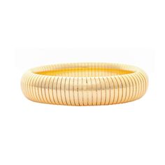 18K Gold Clad Slide On Bangle Bracelet with Polished Finish and a touch of Stretch Measures .5" Thick, 2.5" diameter Slinky Flexible Bangle Bracelet, Gold Flexible Slinky Bracelet, Gold Beaded Bangle Bracelet With Extender, Adjustable Gold-tone Jubilee Bangle, Slinky Bangle Jewelry As A Gift, Gold Flexible Bangle Bracelet, Adjustable Gold Slinky Bracelets, Adjustable Slinky Stretch Bangle Bracelet, Adjustable Flexible Gold Bangle