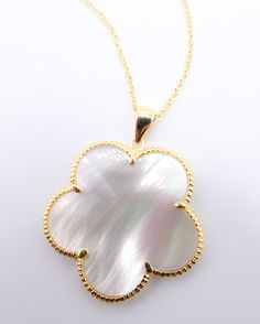 "Luxurious & Classic! This exquisite clover flower pendant necklace features 18kt gold plated mother of pearl shell 5 petal clover flower pendant on thin gold links chain. Measuring 16\" long with a 3\" extender chain and sturdy lobster claw clasp, the gorgeous dainty clover pendant necklace looks elegant in a timeless sophisticated classic style. ☆ Specifications: * 18kt Gold Plated / Mother of Pearl Shell Clover Flower * MEASURES:  16\" Long + 3\" Extender Chain / LOBSTER CLAW CLASP CLOSURE * CLOVER PENDANT:  1 1/4\" Diameter ☆ FREE SHIPPING WITHIN THE USA VIA USPS GROUND ADVANTAGE MAIL. INTERNATIONAL SHIPPING IS ONLY $16.95 USD VIA USPS FIRST CLASS EXPEDITED INTERNATIONAL MAIL SERVICE. ☆ THANKS FOR LOOKING!" Art Nouveau Pendant, Clover Pendant, Clover Flower, Gold Link Chain, Flower Pendant Necklace, Pearl Shell, Mother Pearl, Flower Pendant, Lobster Claw