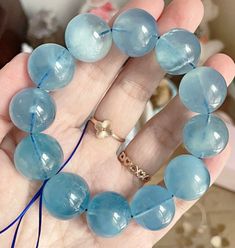 Material:Natural aquamarine beads size :approx 17mm   color:blue green quantity: one strand  6mm approx 29 pcs one strands 7mm approx25 pcs one strands 8mm approx 22 pcs one strands 9mm approx 21pcs one strands 10mm approx 19 pcs one strands 11mm approx 18pcs one strands 12mm approx 16 pcs one strands 13mm approx 16 pcs one strands 14mm approx 15 pcs one strands 15mm approx 14pcs one strands 16mm approx 14 pcs one strands 17mm approx 13pcs one strands 18mm approx 13pcs one strands 19mm approx 12 Turquoise Aquamarine Bracelets With Round Beads, Turquoise Aquamarine Beaded Bracelets, Beaded Aquamarine Bracelets With Natural Stones, Aquamarine Beaded Bracelets With Natural Stones, Aquamarine Natural Stone Beaded Bracelets, Handmade Aquamarine Beaded Bracelets, Light Blue Aquamarine Beaded Bracelets For Gift, Light Blue Aquamarine Beaded Bracelets As Gift, Blue Aquamarine Beaded Bracelet With Natural Stones