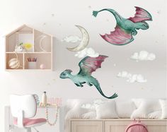 two green and pink dragon wall decals in a child's room with white walls