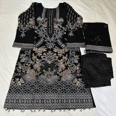 Pakistani Attire, Desi, South Asian, Handmade/Embroidery. Color: Black Size: M, 40-42 (Medium) Materials* Dress/Top: Inner Is Cotton, Outer Is Chiffon, Embroidery Pants/Trousers: Viscose Jacquard Dupatta/Scarf: Chiffon, Embroidery Black Embroidered Fabric For Designer Wear During Eid, Black Semi-stitched Embroidered Fabric, Black Semi-stitched Sets For Eid, Black Anarkali With Intricate Embroidery, Elegant Black Georgette Set, Semi-stitched Black Unstitched Suit With Chikankari Embroidery, Black Unstitched Suit With Chikankari Embroidery For Festive, Festive Black Unstitched Suit With Chikankari Embroidery, Unstitched Black Resham Embroidered Fabric