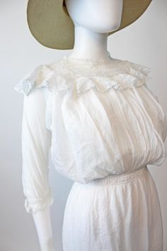 "Sweet and totally wearable Edwardian dress! Done in a delicate cotton with tons of filet lace detailing throughout. This is incredible since it has so many attached layers. The bodice has a cotton corset tank style top that buttons in back and then the sheer ruffled lace layers over that. The tiniest buttons are on the back of this layer. Both pieces are fully pintucked. Lace skirt has three layers with lace on each layer. Waist has slits for a ribbon to thread through if you desire! And the ow Cotton Lace Dress, Filet Lace, Cotton Corset, Edwardian Dress, Lace Layers, Layer Dress, Vintage Cotton, Fashion History, Cotton Lace