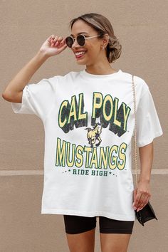 CAL POLY MUSTANGS SHAKEDOWN OVERSIZED CREWNECK TEE Oversized Crew Neck College Style T-shirt, College Style Crew Neck T-shirt With Letter Print, Crew Neck Top With Screen Print For College, College Style Crew Neck Top With Screen Print, Relaxed Fit Graphic Tee For College, Screen Printed Crew Neck Tops, Summer Streetwear T-shirt With School Spirit, Collegiate Summer T-shirt, Oversized Slogan T-shirt For College