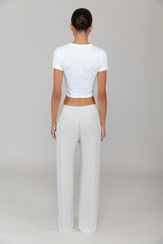 Cut in our slightly stretchy cotton rib, The Kelly Scoop Neck tank is a modern classic. Featuring a classic crew neckline, cropped length, and wide finished edges. Basic Cropped T-shirt For Loungewear, Fitted Tops With Elastic Waistband For Loungewear, Everyday Cropped Cotton Bottoms, Versatile Relaxed Fit Crop Top For Loungewear, Versatile Cropped Bottoms For Loungewear, Versatile Cropped White Bottoms, Versatile White Cropped Bottoms, Versatile Cropped Relaxed Fit Pants, White Cropped Bottoms For Loungewear