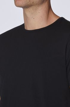 A curved hem enhances the fit of this versatile crewneck T-shirt made from a soft cotton blend. Crewneck Short sleeves 62% polyester, 33% cotton, 5% spandex Machine wash, dry flat Imported Casual Crew Neck Muscle Tee For Layering, Black Cotton Muscle Tee For Layering, Basic Muscle Tee With Crew Neck, Stretch Muscle Tee With Crew Neck For Streetwear, Basic Black Crew Neck Muscle Tee, Sporty Crew Neck T-shirt For Layering, Black Relaxed Fit Muscle Tee With Crew Neck, Stretch Muscle Tee With Crew Neck For Everyday, Basic Stretch Muscle Tee With Crew Neck