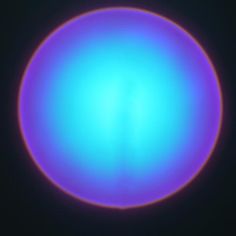 an image of a blue circle in the dark