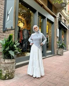 Skirts are trendy this summer! espeicially white ones🤍 get it at the link down below! Dresses Casual For Hijab, Cute Hijabi Outfits Dresses, Modest Fits Casual, Hijabi Overalls Outfit, Modest Fashion Summer Casual, Y2k Fashion Modest, Hijabi Cool Outfits, Hijabi Skirt Fits, Summer Fit Modest