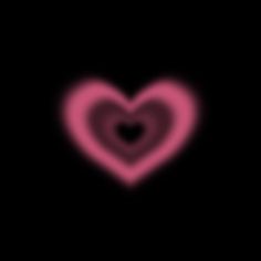 a pink heart on a black background