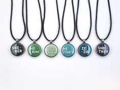 "This emerald green pronoun necklace is a simple and colorful way to share your pronouns. The magnetic metal pendant is strong enough to hold these 1\" pronoun buttons in place, but they are simple to swap out making it easy for you to change the color of your necklace or change the pronouns you have on display. This set includes 1 necklace with all six vivid sunrise colors in your choice of pronouns." Pronoun Necklace, Sunrise Colors, Magnetic Necklace, Curling Ribbon, Metal Pendant, Emerald Green, Friends In Love, Buttons Pinback, Washer Necklace