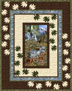 an image of a quilt with deer and flowers on it's border, in the middle