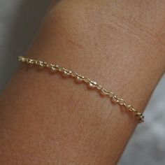 One of our newest chains! Every other link has a starburst imprinted✨ Perfect for layering! Lightweight for comfort and every day wear 14kt gold filled Dainty 14k Gold Filled Tarnish Resistant Bracelet, Dainty Tarnish Resistant 14k Gold Filled Bracelet, Dainty 14k Gold Filled Adjustable Chain Bracelet, Delicate 14k Gold-filled Chain Bracelet, Dainty 14k Gold Link Bracelet, 14k Gold Filled Satellite Chain Bracelet, Gold 14k Gold-filled Satellite Chain Bracelet, Gold Satellite Chain Bracelet, 14k Gold Filled, Dainty 14k Gold Bracelet With Satellite Chain