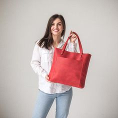 This handmade women tote bag is produced by crazy horse leather. It has one pocket inside. The bag has a high-quality zipper that secures your belongings. It holds the shape perfectly and you may be confident that your things like cell phone, tablet, lap-top are safe. This bag is simple, reliable, and durable. Its universal look allows using the tote bag for various purposes. One may take the bag to the work, shopping, meeting, or walk and feel comfortable with it in any condition.SIZE:      〰️ Large Capacity Red Leather Backpack For Everyday Use, Red Leather Backpack For Everyday Use With Large Capacity, Red Bag With Smooth Grain, Red Bags With Smooth Grain, Red Smooth Grain Bag For Everyday, Everyday Red Smooth Grain Bag, Red Shoulder Bag With Smooth Grain For Daily Use, Red Smooth Grain Shoulder Bag For Daily Use, Red Smooth Grain Shoulder Bag For Everyday