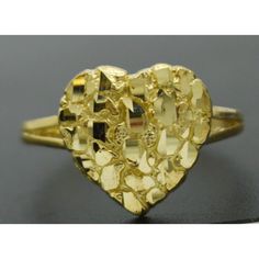 Our Nugget Heart Rings Are Fashionable And Comfortable To Wear. Our Real Solid 10k Yellow Gold Womens Nugget Heart Ring 1.8 Grams All Sizes Are Sure To Make The Perfect Gift For A Loved One. It’s Time To Celebrate The Love That You Partake With Your Loved Ones With These Beautifully Crafted And Intricately Designed Classic Rings. Hurry! Get Yours Today! Specifications: Metal: Real 10k Solid Yellow Gold (Stamped, 10k) Condition: Brand New Finish: Polished Total Gram Weight: 1.8 Grams Width: 12.7m Gold Heart Ring With Diamond Cut For Promise, 14k Gold Heart Ring With Diamond Cut, Formal Gold Heart Ring With Diamond Cut, Gold Heart Ring With Diamond Cut Fine Jewelry, Gold Heart Ring With Diamond Cut For Wedding, Gold Diamond Cut Heart Ring For Wedding, Yellow Gold Diamond Cut Heart Ring For Anniversary, Valentine's Day 14k Gold Heart Ring With Diamond Cut, Formal Yellow Gold Heart Ring With Diamond Cut