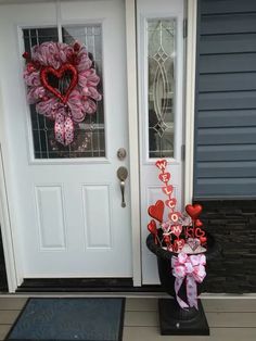 the front door is decorated for valentine's day