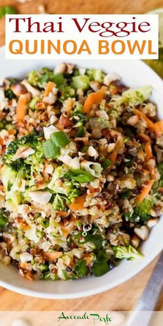 a bowl filled with broccoli, carrots and other vegetables