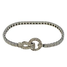 Simon G 18K White Gold Diamond Buckle 7.5" Bracelet (includes appraisal, Value: $11,000) Designer = Simon G Material = 18K Gold Gemstone = Diamond Condition = Good Class = Premier Location: Wilmette Item Number: 16904-99 Item ID: 297774 Category: Bracelet Classic Diamond Bracelet With Diamond Accents For Evening, Classic Diamond Bracelet With Accents For Evening, Classic Evening Diamond Bracelet With Accents, Luxury Platinum Tennis Bracelet With 17 Jewels, Evening Diamond Bracelet With 17 Jewels, Formal Platinum Diamond Bracelet With 17 Jewels, Formal Platinum Bracelet With Single Cut Diamonds, Formal Platinum Bracelets With Single Cut Diamonds, Platinum Bracelets With Single Cut Diamonds For Formal Occasions