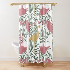 a shower curtain with pink flamingos and palm leaves on it in front of a white bath tub