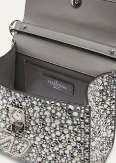 Glamorous Bags With Silver-tone Hardware And Top Handle, Glamorous Top Handle Bag With Silver-tone Hardware, Luxury Evening Bags With Rhinestones, Glamorous Embellished Leather Bags, Glamorous Leather Embellished Bags, Luxury Rhinestone Shoulder Bag For Everyday Use, Luxury Embellished Leather Bag, Luxury Leather Embellished Bag, Luxury Rhinestone Shoulder Bags