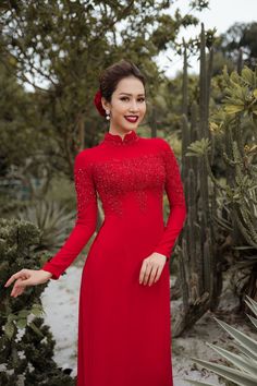 Traditional collar Material: Crepe, lace Long sleeves Traditional ao dai form Ceremonial Long Sleeve Ao Dai, Elegant Red Ao Dai For Ceremonies, Elegant Red Ao Dai For Ceremony, Fitted Long Sleeve Ao Dai For Ceremony, Festive Long Sleeve Ao Dai For Ceremony, Elegant Ao Dai With Lace Sleeves For Ceremony, Festive Long Sleeve Fitted Cheongsam, Traditional Long Sleeve Ao Dai For Formal Occasions, Festive Fitted Ao Dai For Ceremony