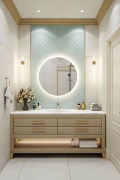 a bathroom with a large mirror above the sink