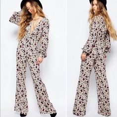 Brand New With Tags Deep V-Neck With Floral Pattern & Long Sleeves Pantsuit/Jumpsuit Stretchy Ruffled Band Around Waist Colors: Cream, Burgundy, And Black Size 6 (Small) Zipper On Left Side And Two Clasps On Chest 52% Viscose, 48% Rayon Beautiful Print & Material Smoke & Pet Free Home! Bundle To Save! Summer Cream Long Sleeve Jumpsuits And Rompers, Cream Long Sleeve Jumpsuits And Rompers For Summer, Cream Long Sleeve Jumpsuits For Summer, Spring Beige Floral Print Jumpsuits And Rompers, Beige Floral Print Jumpsuits And Rompers For Spring, Cream Long Sleeve Jumpsuits And Rompers For Spring, Cream Long Sleeve Jumpsuits For Spring, Chic Floral Print Jumpsuits And Rompers For Fall, Cream Jumpsuits And Rompers For Spring Party